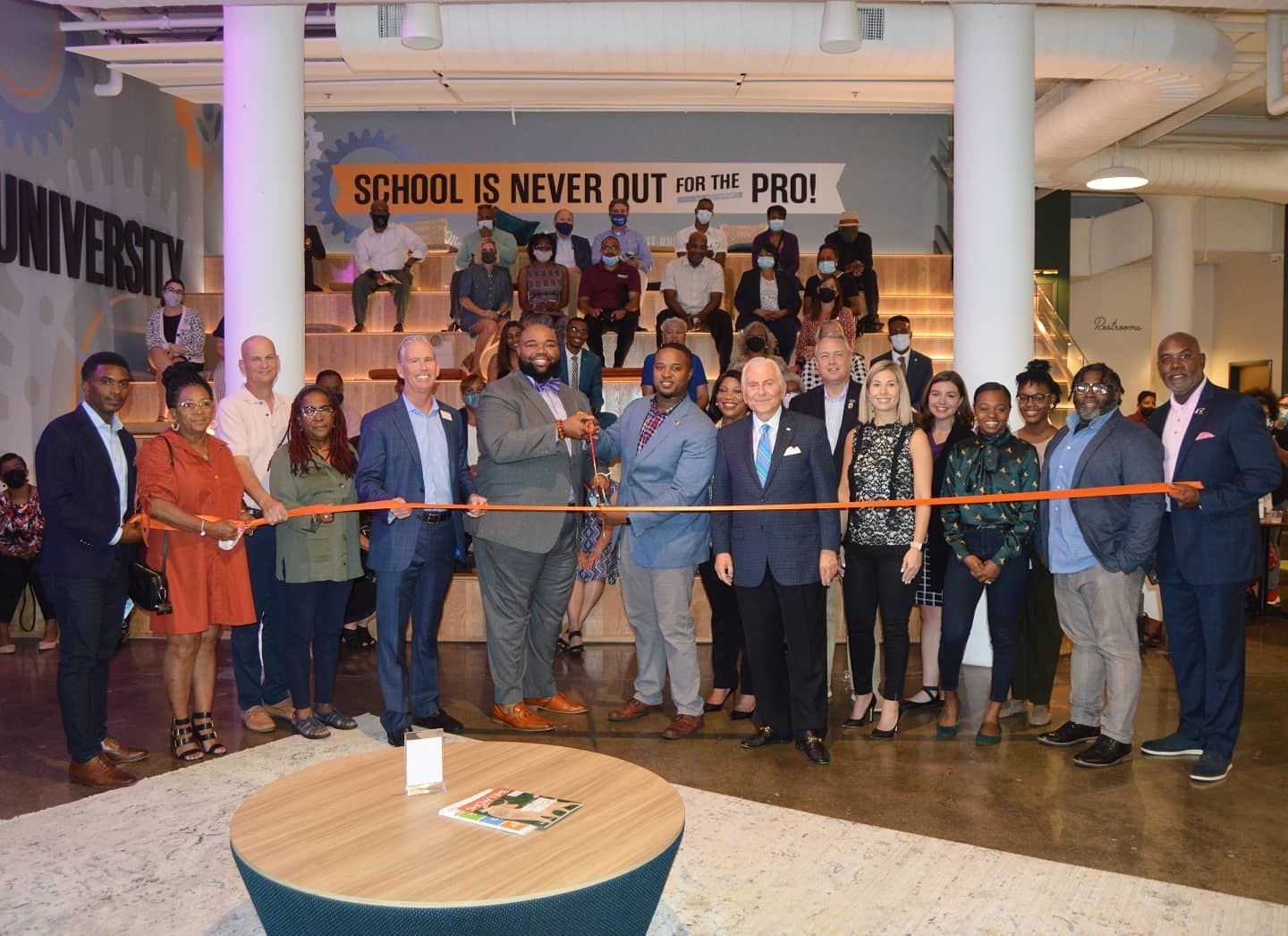 an image of a ribbon cutting